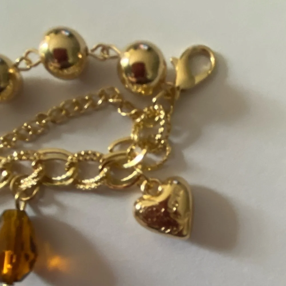 None boutique gold